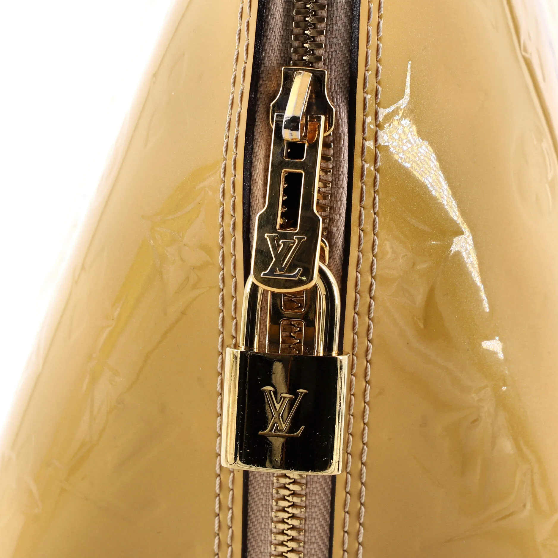Alma Handbag Monogram Vernis PM