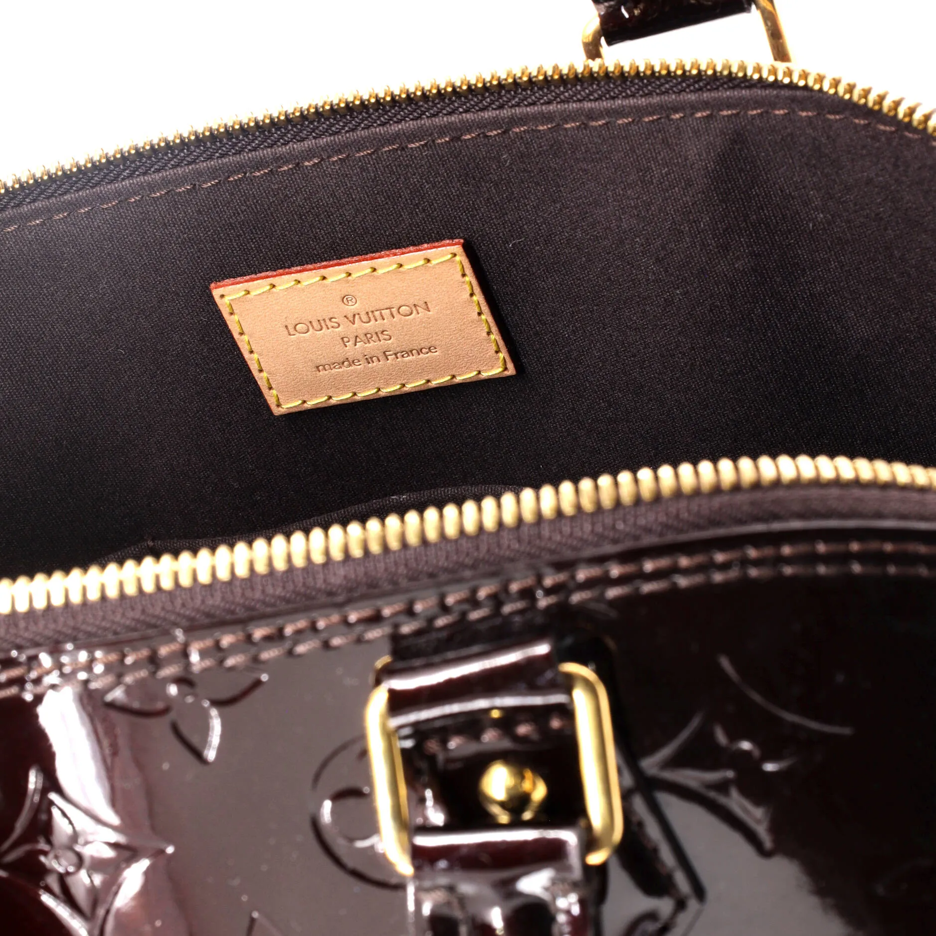 Alma Handbag Monogram Vernis PM